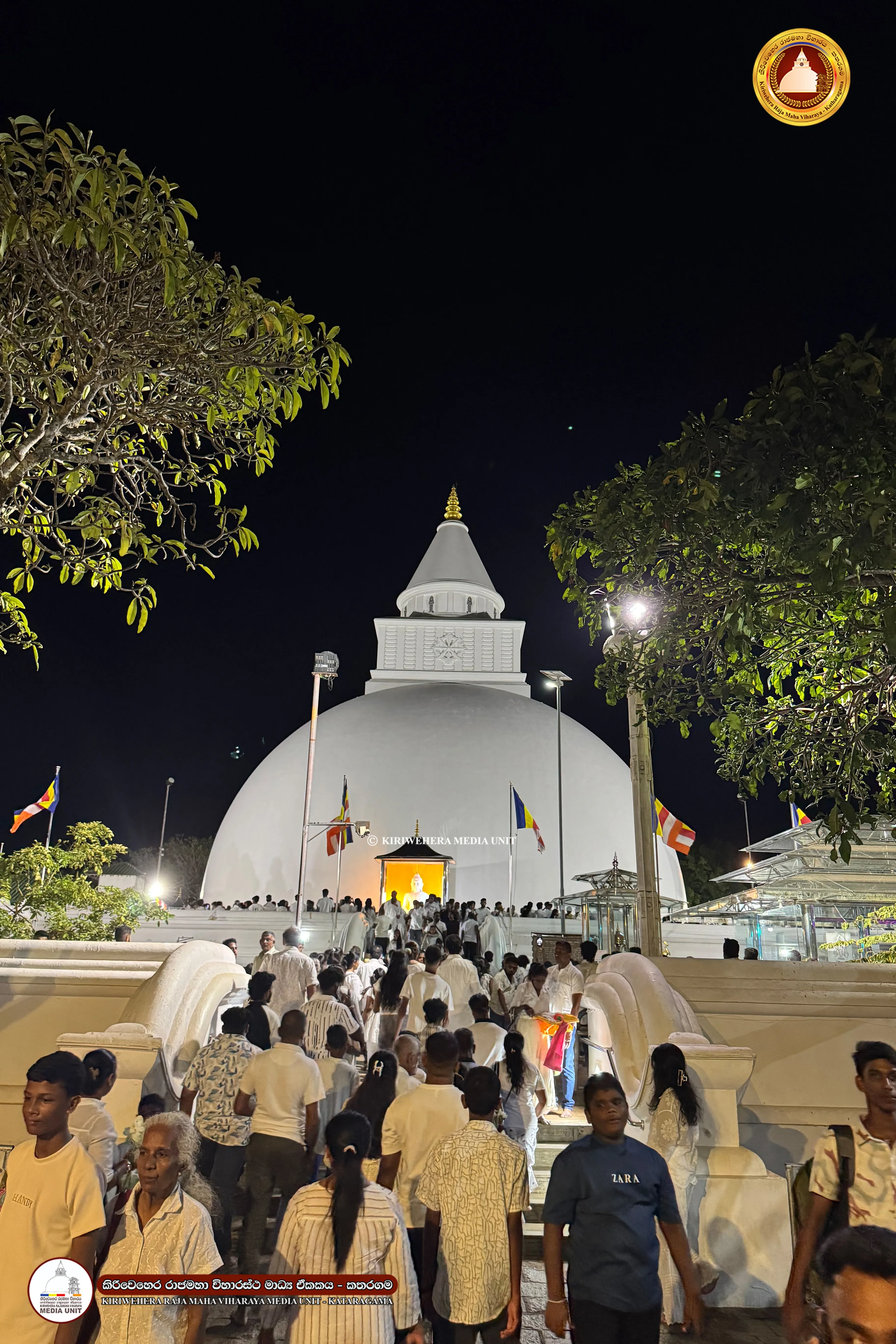 The historic Kataragama Kiriwehera Raja Maha Vihara, filled with devotees on the day before the Niki
